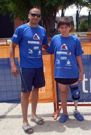 Amílcar y Carlos, su papá y compañero.
